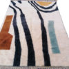 Abstract berber handknotted rug cream black orange blue