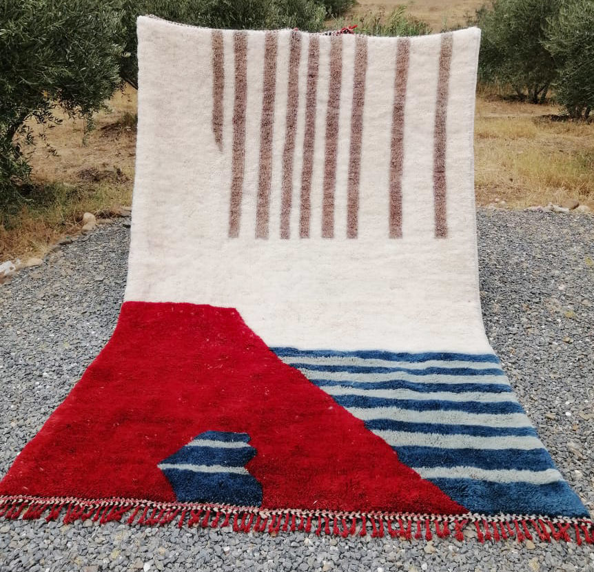 Abstract moroccan wool rug white red blue and taupe