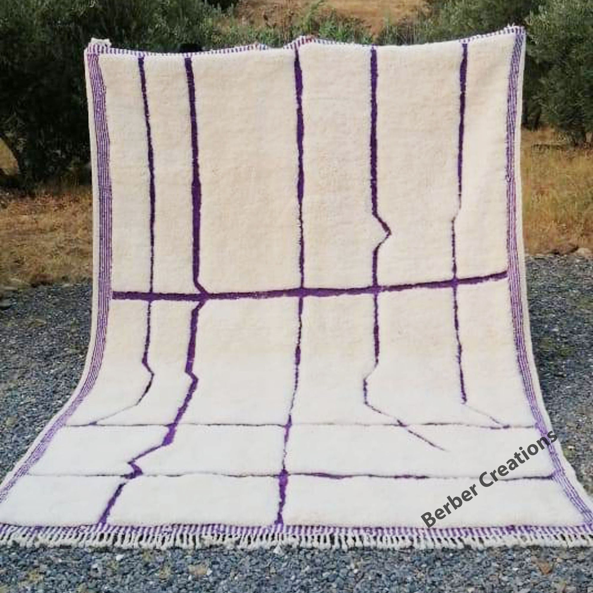 Moroccan beni mrirt wool rug purple and white