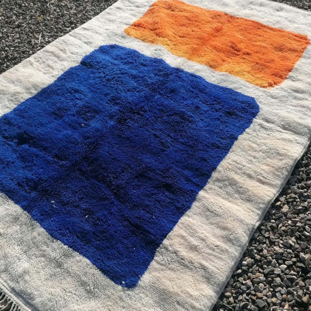 moroccan geometric wool rug blue and orange