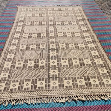 Stunning One-of-a-kind Flat Weave Zanafi Moroccan rug  6.7’x 10′
