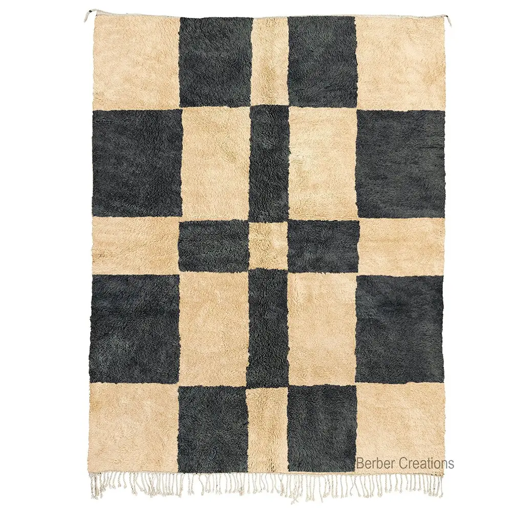 Handcrafted Moroccan Berber rug with a bold black and beige checkerboard pattern