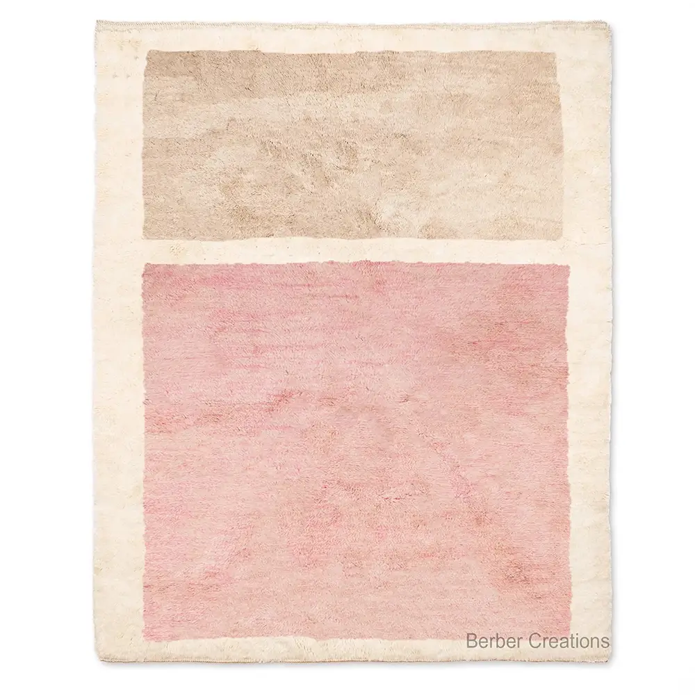 Minimalist Beni Ourain SAKURA rug with soft pink and beige color blocks on an off-white wool background