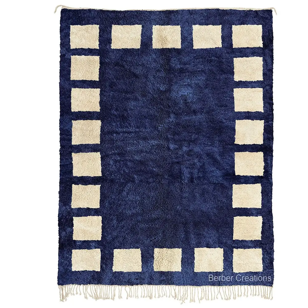 Navy blue Moroccan rug with off-white block border