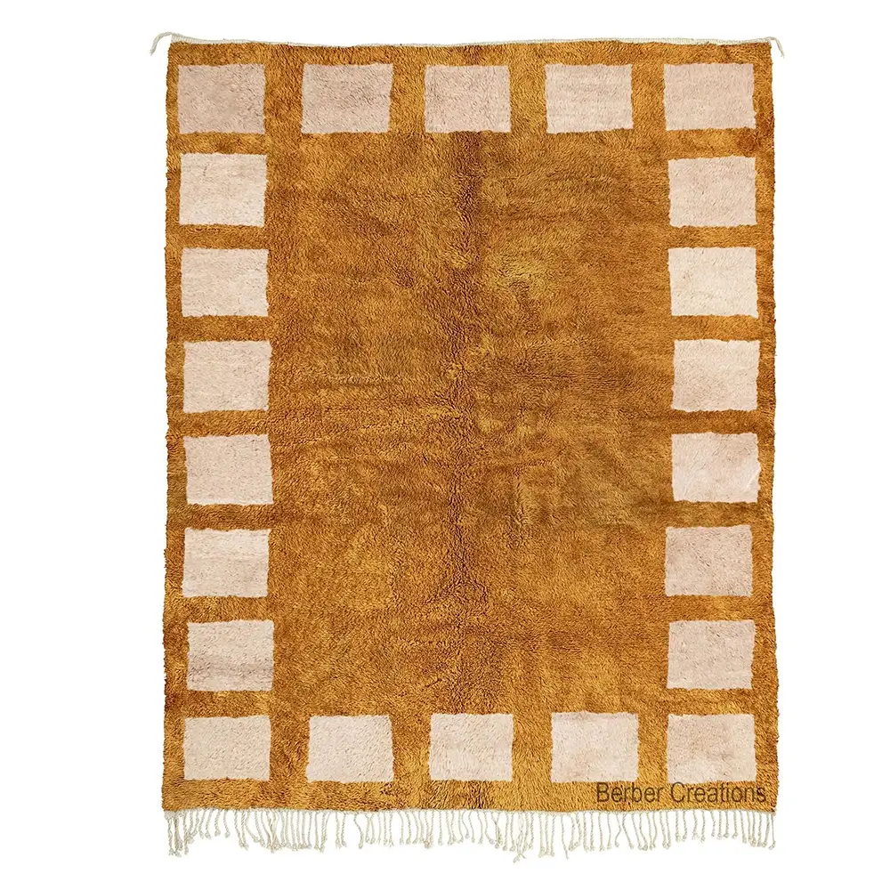 Moroccan Shag Rug in rich golden-brown wool with a border of light cream geometric squares