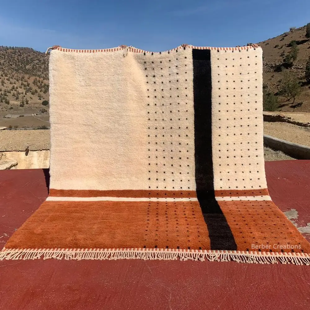 Taroubia Beni Mrirt rug, hand-knotted wool, bold graphic pattern in ivory, terracotta, and black block colors