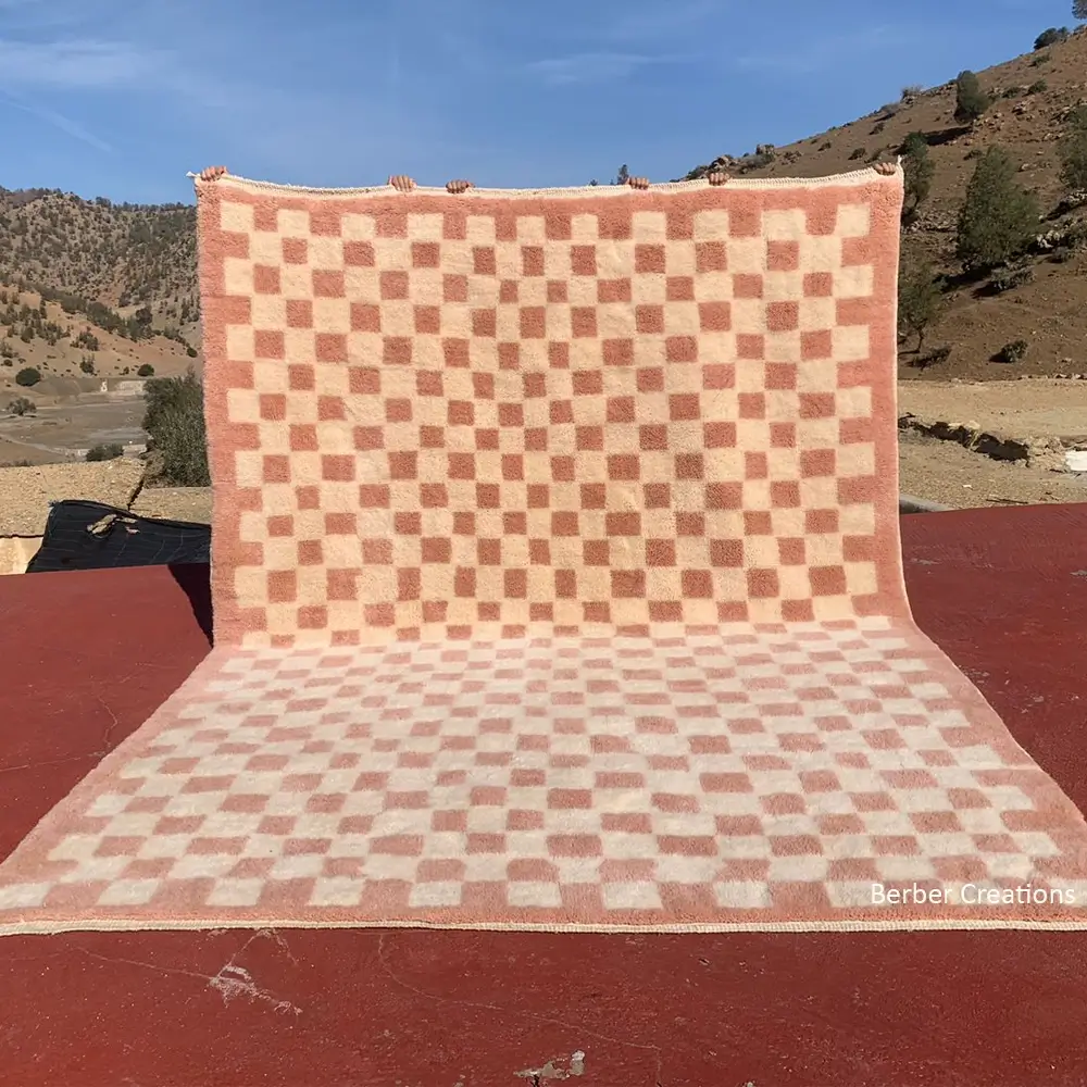 Beni Mrirt shag rug with a modern pink and natural beige checkerboard geometric pattern.