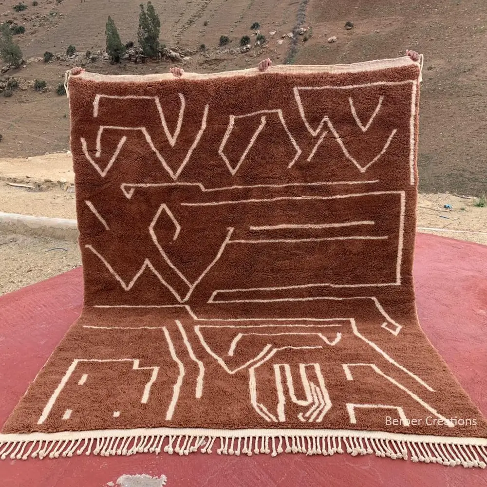 Luxury handwoven Beni Mrirt Chocola rug, featuring bold white abstract lines on a rich brown wool pile
