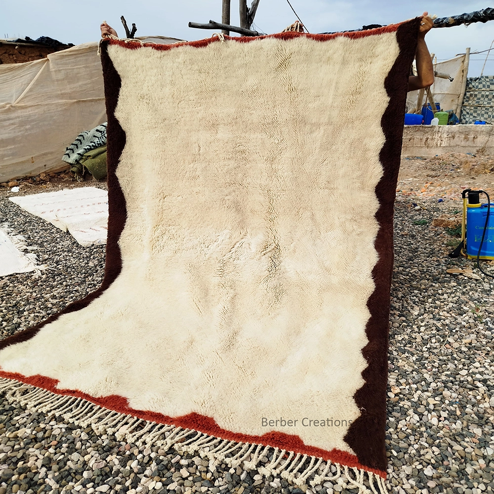 Authentic Beni M'rirt Moroccan rug featuring a retro wavy scalloped border in chocolate brown, terra cotta, and ivory cream wool