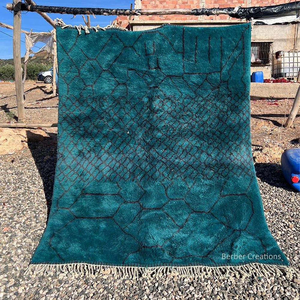 Hand-knotted teal blue Moroccan Berber rug with a dark abstract geometric line pattern sounia