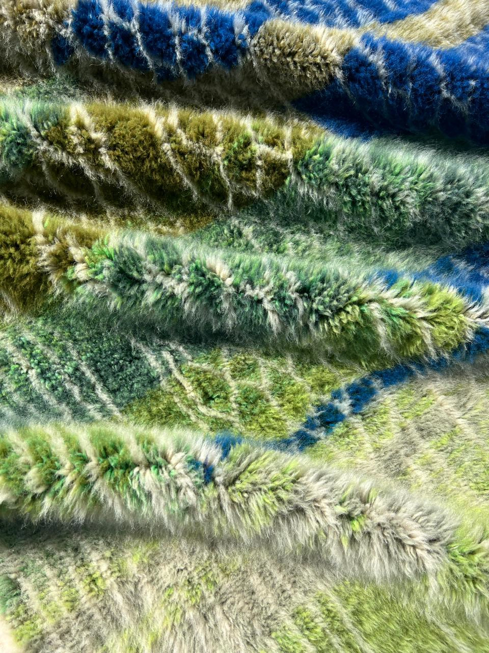 contemporary Moroccan wool rug green, navy blue, and sage details 2