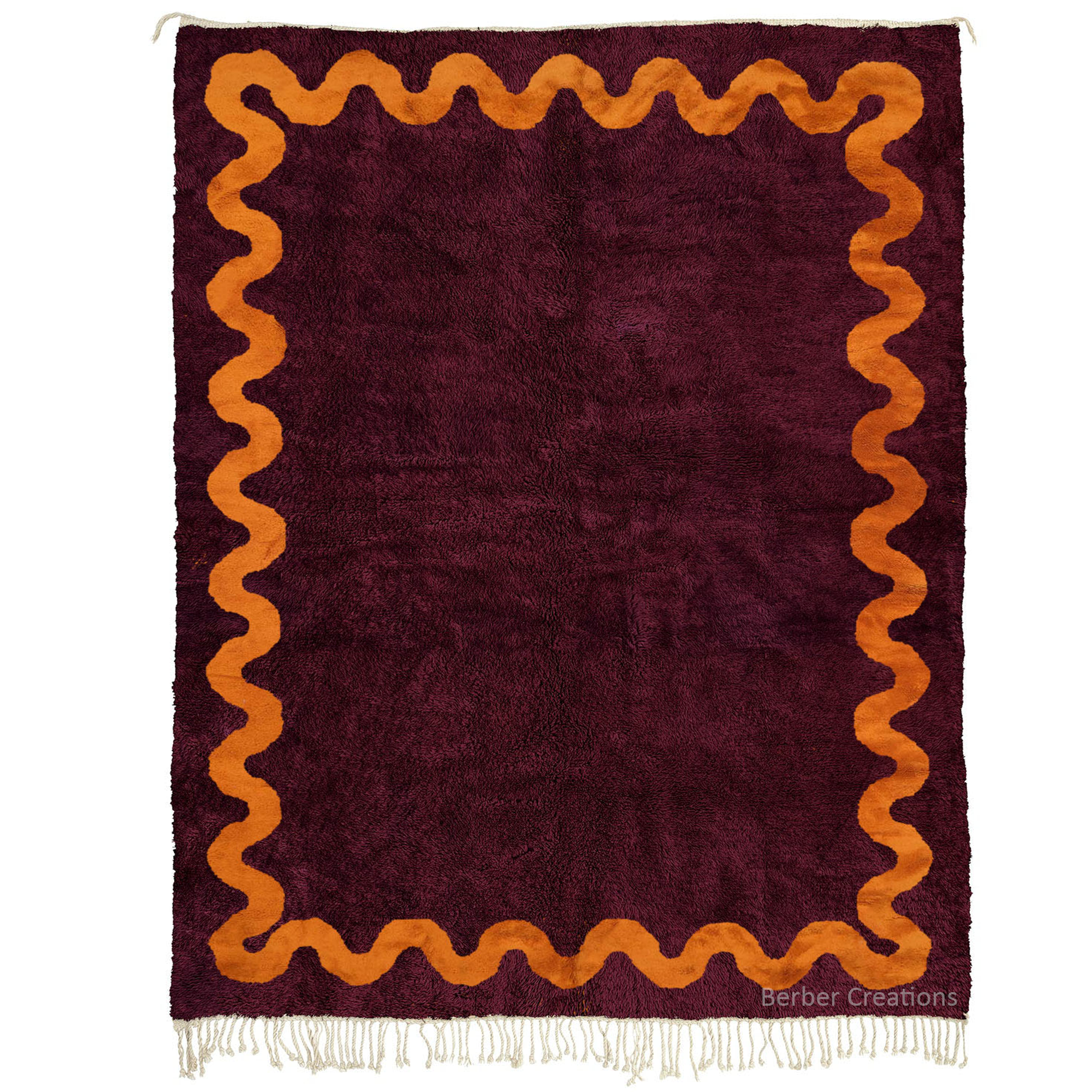 Moroccan rug beni deep plum burgundy and a vibrant burnt orange wavy squiggle border