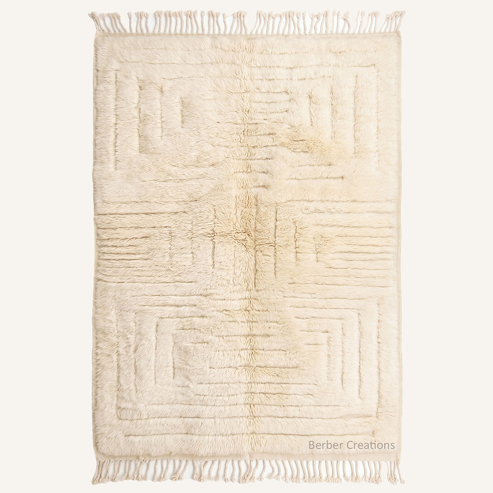 The Alabaster Labyrinth – Luxurious ivory and cream geometric custom Moroccan rug with 3D carved design, hand-knotted by Berber Creations.