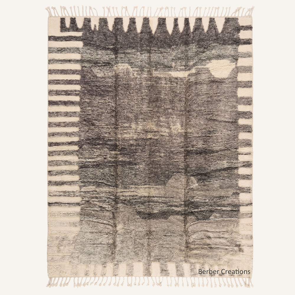 The Granite Glyph – Deep charcoal and ivory custom Moroccan rug with geometric border patterns, hand-knotted by Berber Creations.