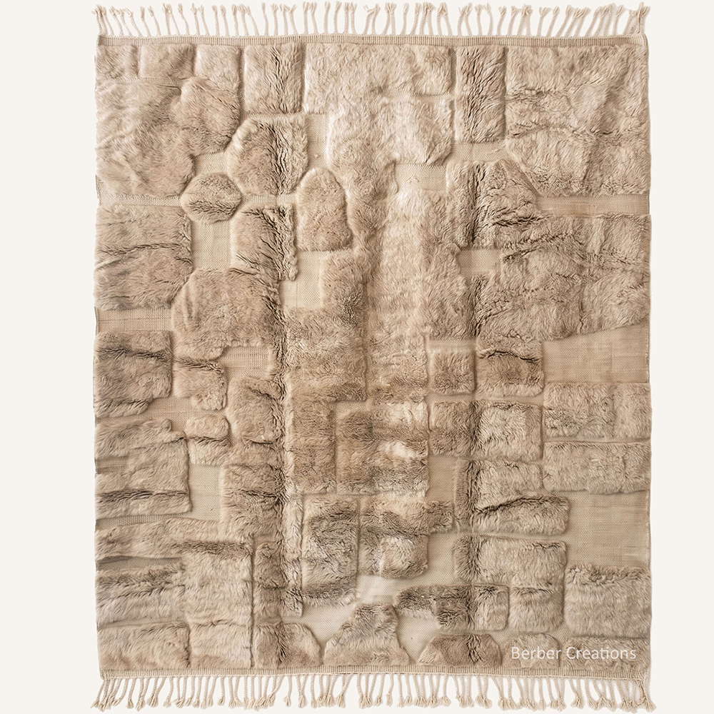 the Ivory Incision – Sculptural ivory custom Moroccan rug with 3D carved channeled design, hand-knotted by Berber Creations.