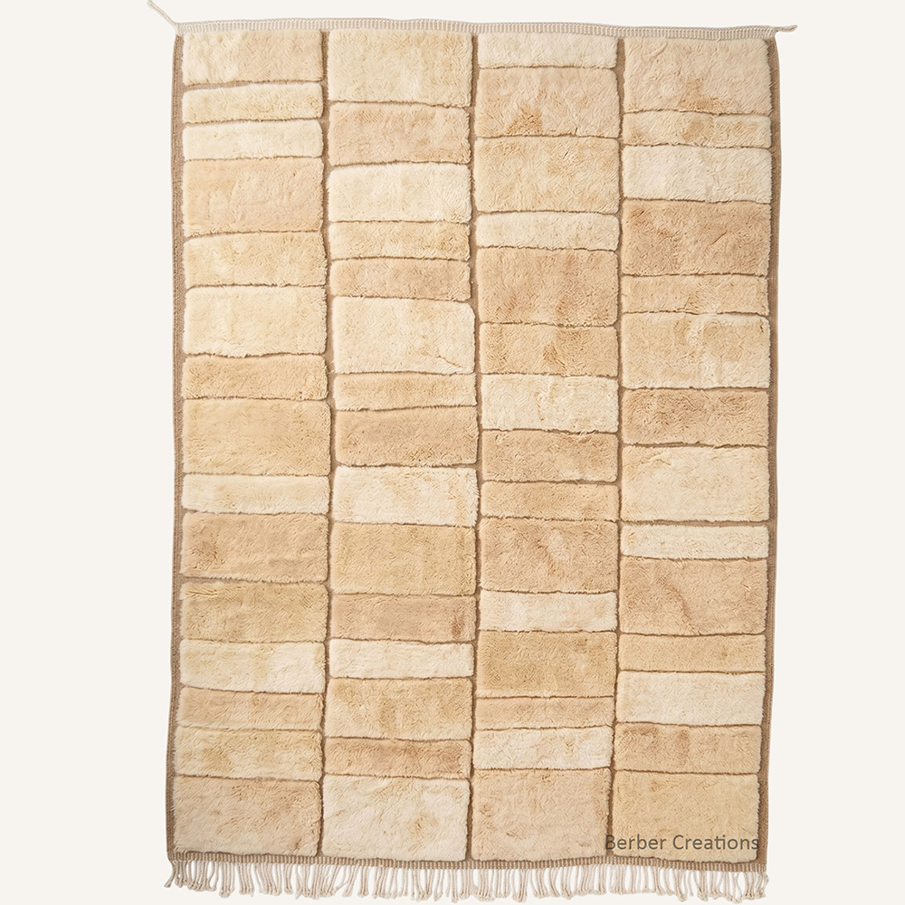The Desert Horizon 3D waffle grid carved beige and cream Moroccan wool rug, hand-knotted in the Berber Creations workshop
