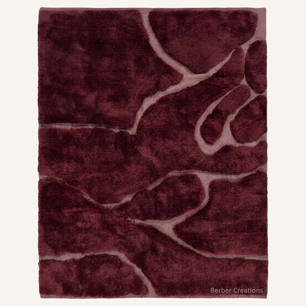 Crimson Organic Relief 3D carved burgundy Moroccan rug with plush wine red shapes on a flat woven mauve base by Berber Creations