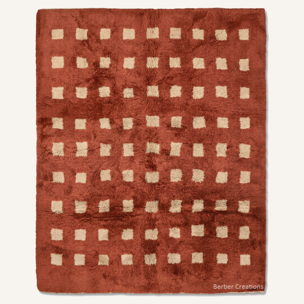 Terracotta Pixel 3D textured terracotta Moroccan rug with plush rust wool and a geometric grid of beige squares by Berber Creations