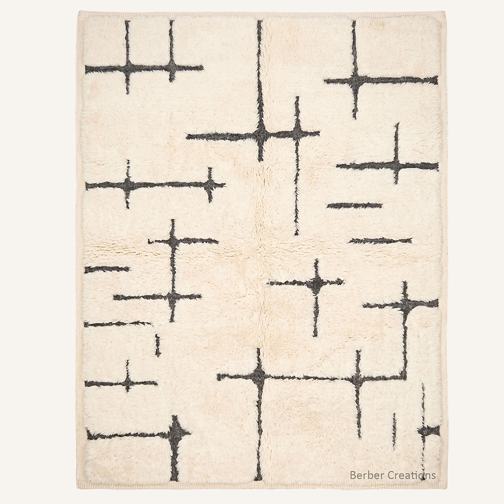 Flat-lay view of The Charcoal Cipher authentic charcoal and ivory Moroccan wool rug, featuring an abstract, rhythmic cross-hatch pattern over a natural cream foundation.