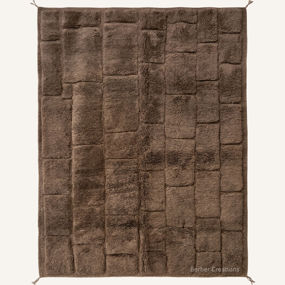 The Cocoa Blocks authentic espresso brown Moroccan wool rug, featuring an intricate hand-carved 3D block pattern with a dense plush pile and clean tailored edges.