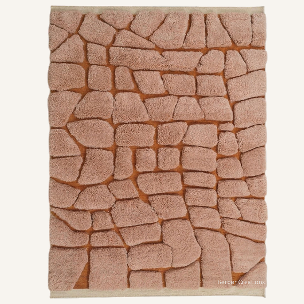 Mosaic "Amber Pathways" Moroccan wool rug with plush pile, featuring an organic paving stone pattern of blush pink blocks outlined by rich amber lines, hand-knotted by Berber Creations.