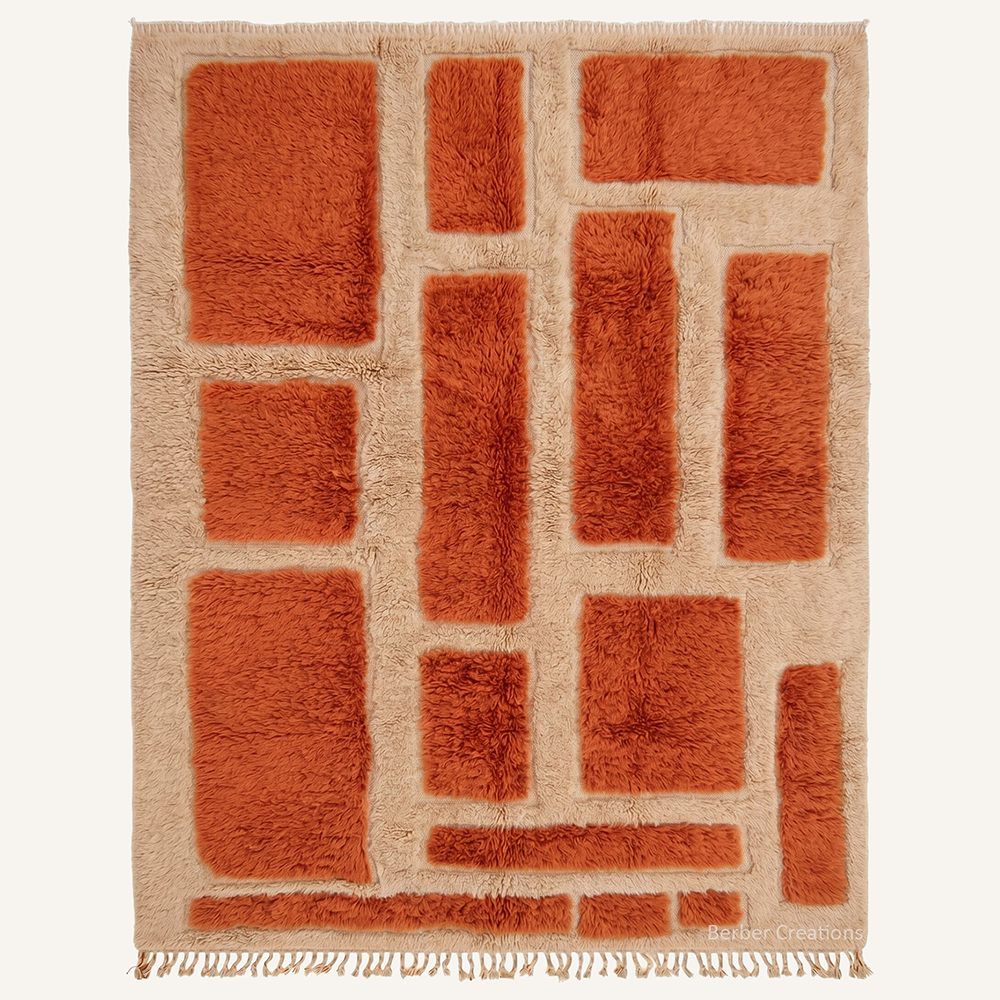 Geometric "Amber Terraces" Moroccan wool rug with plush pile, featuring alternating staggered blocks of amber, caramel, and cream borders, hand-knotted by Berber Creations.