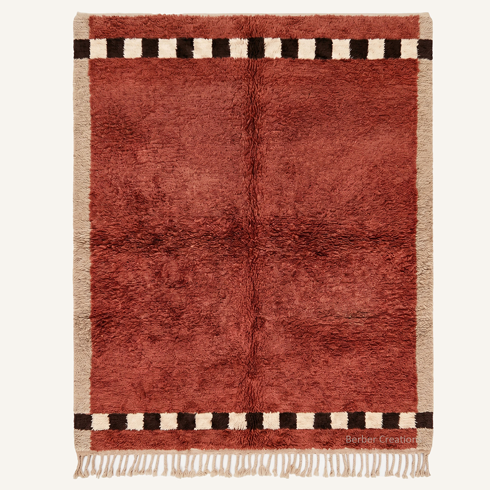 Abstract "Burgundy Meridian" Moroccan wool rug with plush pile, featuring a deep burgundy field and checkered black and cream borders, hand-knotted by Berber Creations.