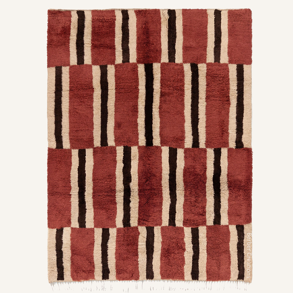 Geometric "Crimson Rhythm" Moroccan wool rug with plush pile, featuring alternating staggered panels of burgundy, mocha brown, and cream vertical stripes, hand-knotted by Berber Creations.
