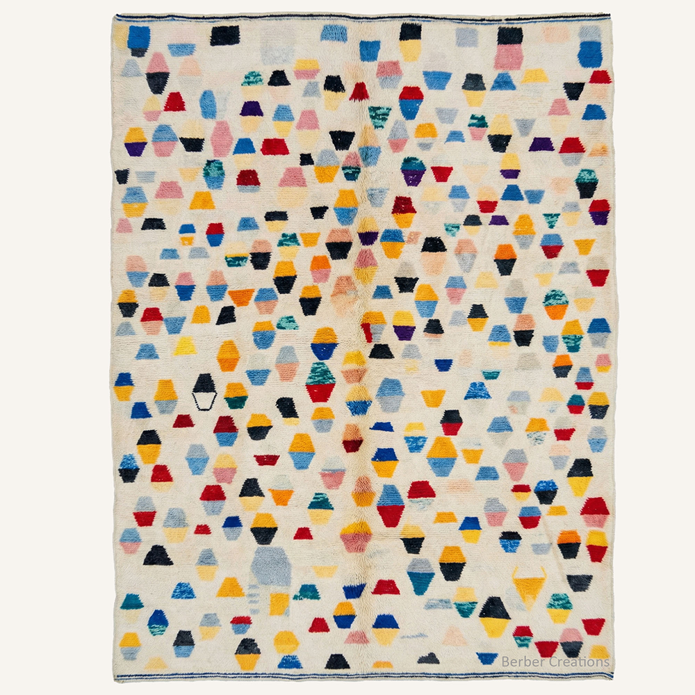 Colorful abstract geometric "Kaleidoscope Confetti" Moroccan wool rug with multi-colored shapes on cream pile, hand-knotted by Berber Creations