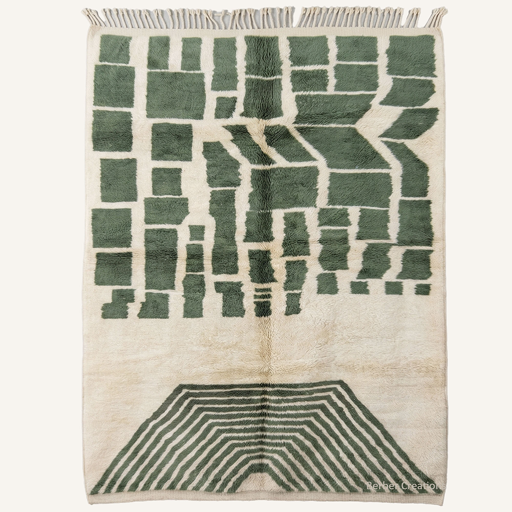 Abstract "Olive Mosaic" Moroccan wool rug with plush pile, featuring green geometric blocks and a linear arch pattern on a soft cream background, hand-knotted by Berber Creations.