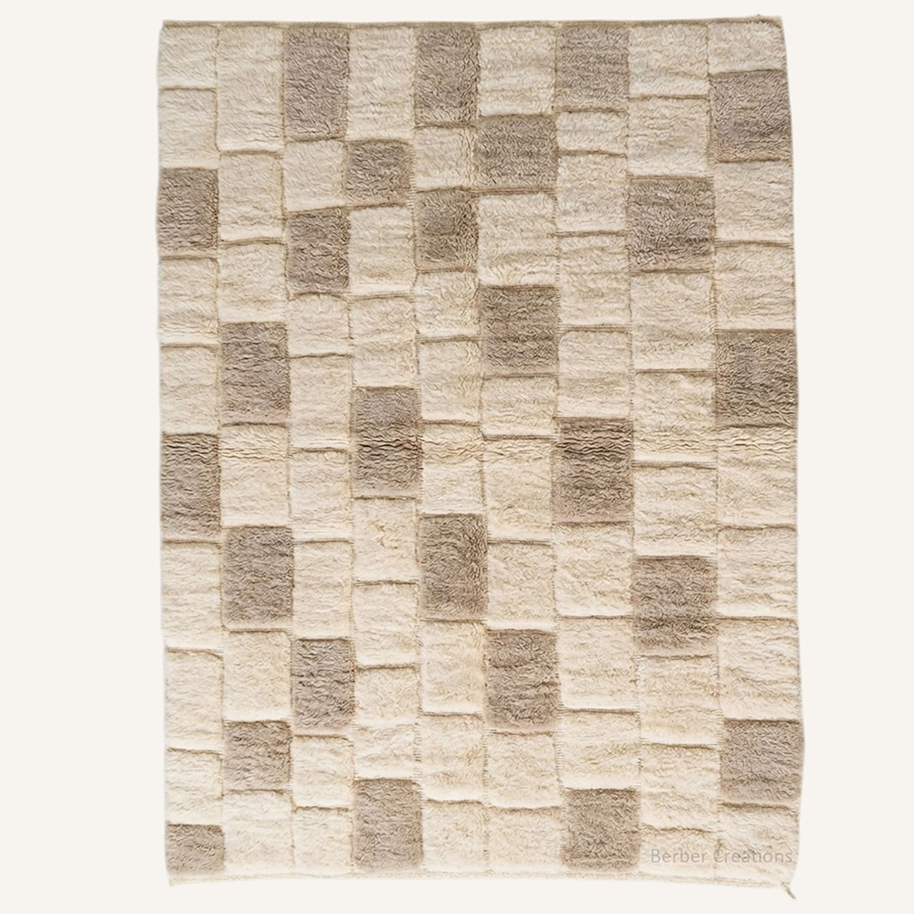 Soraya structural high-pile hand-knotted Beni Mrirt wool rug in Taupe and cream with a staggered checkerboard block pattern, crafted in the Berber Creations workshop.
