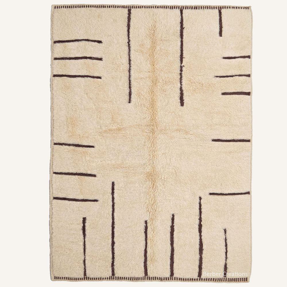 Abstract "Umber Lines" Moroccan wool rug with plush pile, featuring fine dark brown geometric lines on a soft cream background, hand-knotted by Berber Creations.