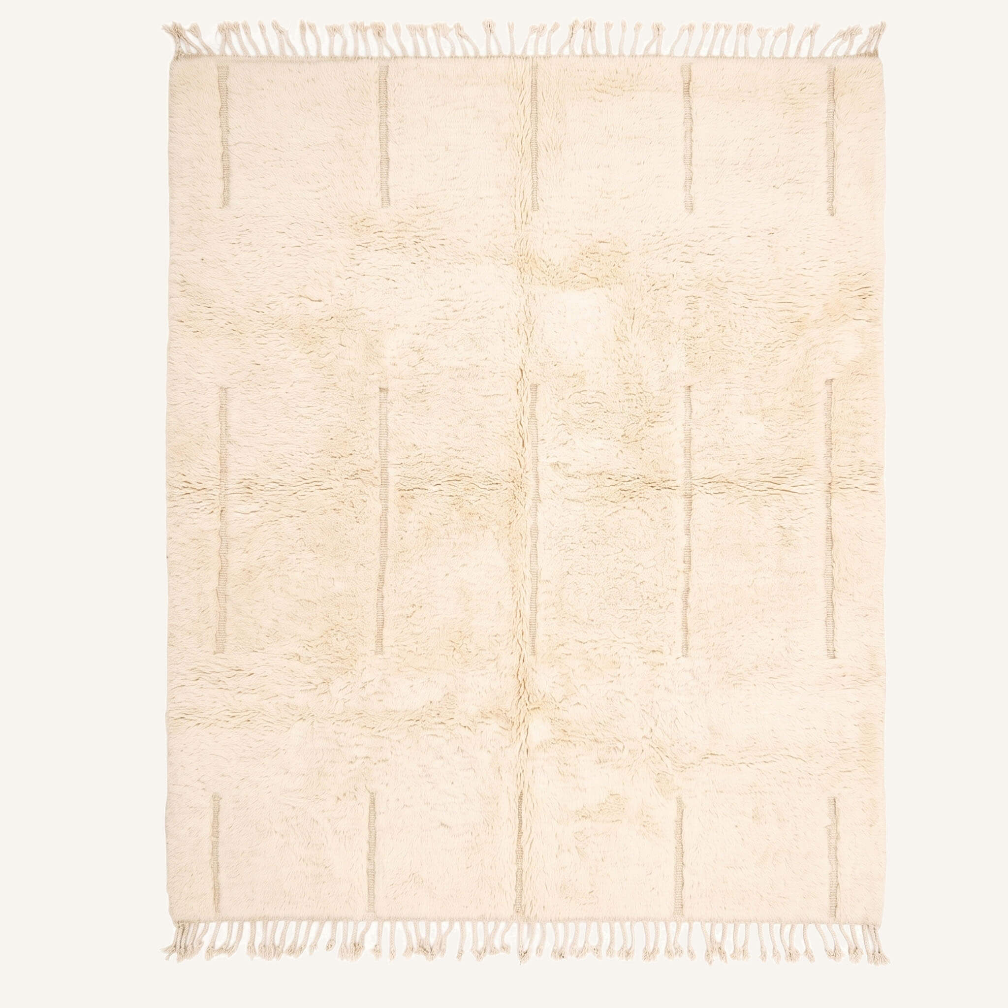 Tafoughalt handmade Moroccan Berber wool rug featuring a plush natural cream and off-white pile accented with subtle vertical dashed lines